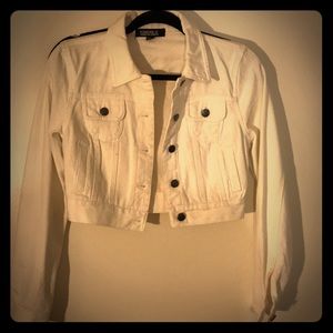 a white cropped denim jacket